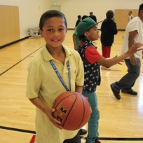 Youth with basketball at open gym