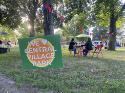 Sign in a park that reads "We love Central Village Park"