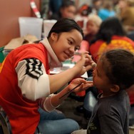 Rec Leader face painting at Supper with Santa event
