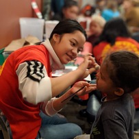 Rec Leader face painting at Supper with Santa event