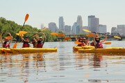 Paddle Share group photo of kayakers going down Mississippi River