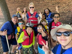 Youth and staff in lifejackets 