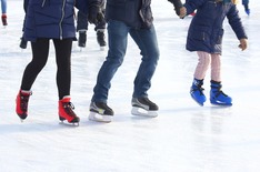 Three ice skaters