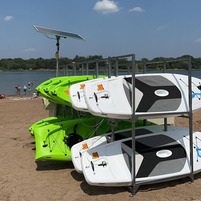 Kayaks and paddle boards at Lake Phalen Beach