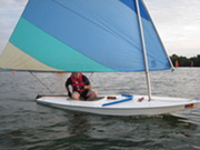 Participant in sail boat on Lake Phalen 