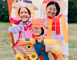 Fall festival hole board with scarecrow body