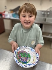 Youth showing off decorated cookie_cropped