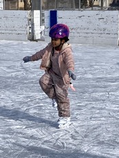Solo girl ice skating