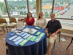 HREEO staff at an outreach event. 