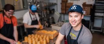 Retail worker smiles for the camera