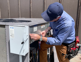 Technician working on HVAC