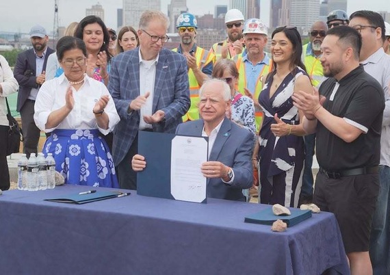 Mayor Her with Governor Walz signing the bonding bill