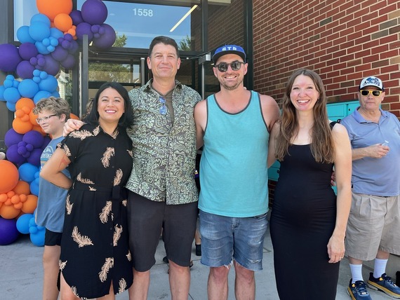 Community leaders celebrate at the library grand opening. 