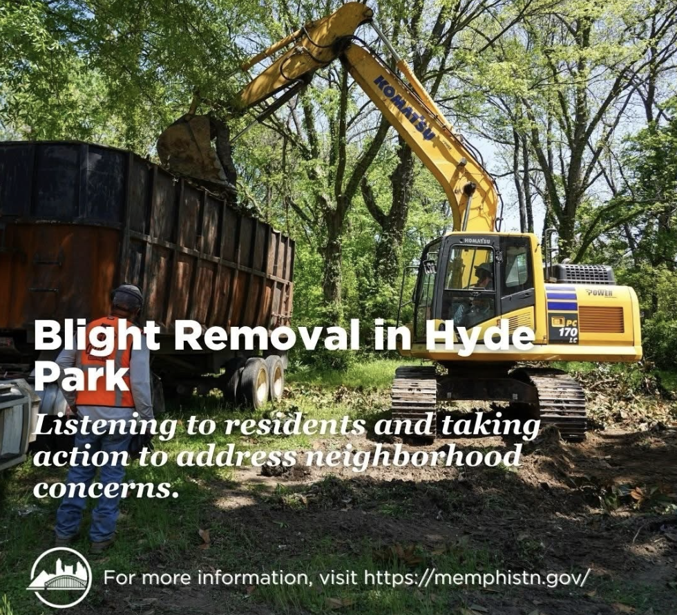 Image of excavator removing debris from blighted property to make our city cleaner. 