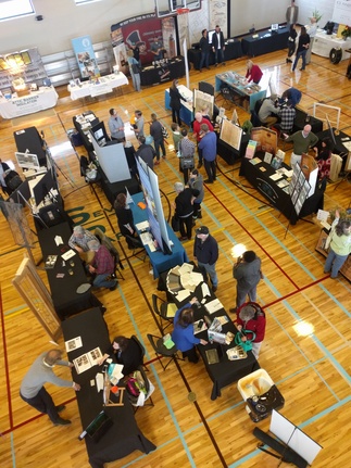 wide shot of exhibitor tables