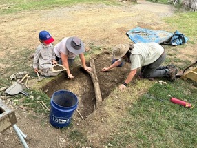 family doing excavation at Fort Negley
