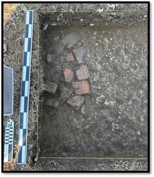 archaeology test pit with bricks