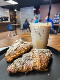 Photo of croissant and iced coffee
