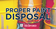 Cans of paint with paint dripping down the sides