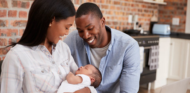 Photo of a father, mother and baby