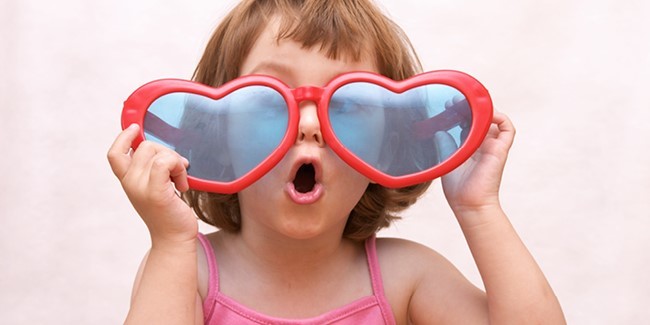 CROPPED girl with heart glasses
