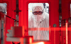 A scientist at Texas Instruments works in a high tech lab