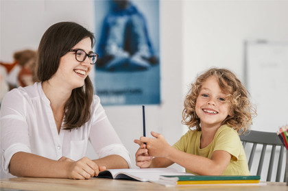 Foster parent working with child