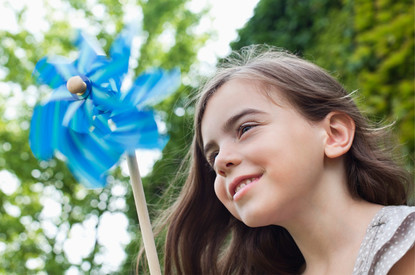 Girl with blue pinwheel