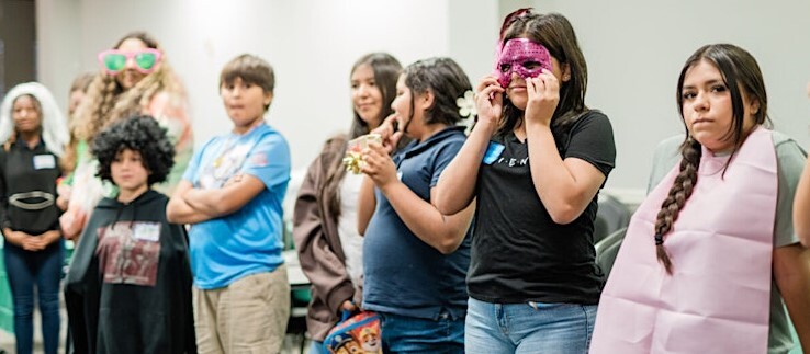 Teenagers participating in Cafe Wow program