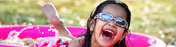 Girl in kiddie pool