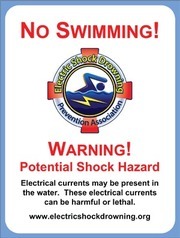no swimming near boat dock sign