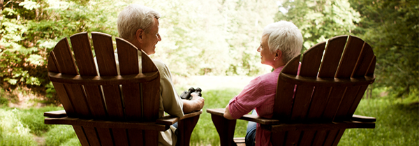 older couple in deck chairs