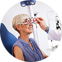 older woman in vision exam