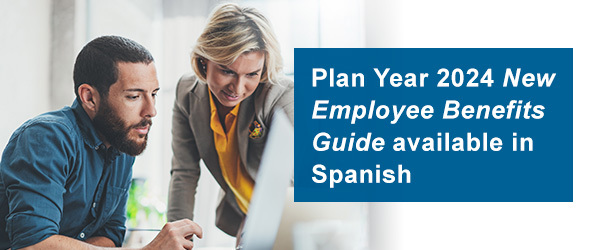 Plan Year 2024 New Employee Benefits Guide available in Spanish. Coworkers at a desk looking at a laptop screen.