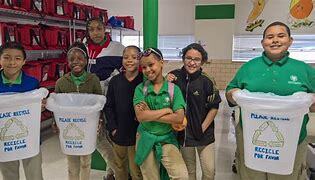 Students can participate in School Green Teams to practice taking care of the environment.