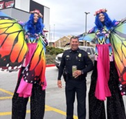 Lt Hill with stilt walkers