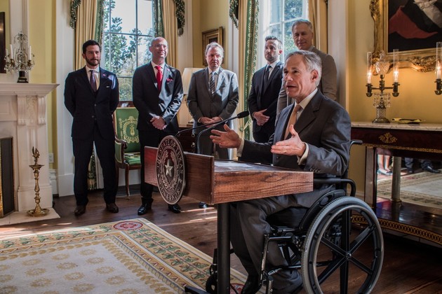 photo of from March 2019 of Governor Greg Abbott announcing BMI opening a new Texas office 