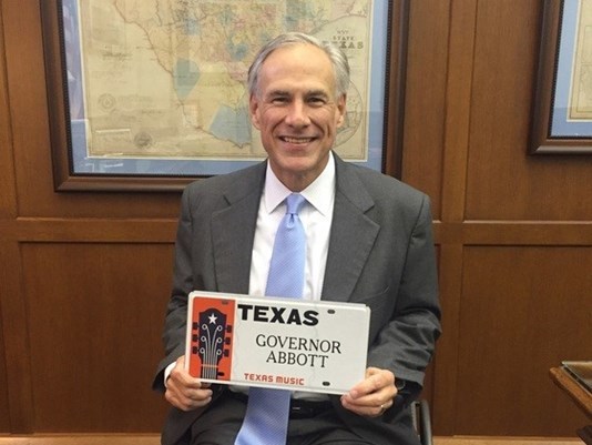Governor Greg Abbott with TMO license plate
