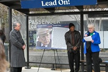 A picture of Ann Washington, Justin Dart's daughter, speaking at the Justin Dart, Jr. "Lead On!" Transit Station Commemoration.