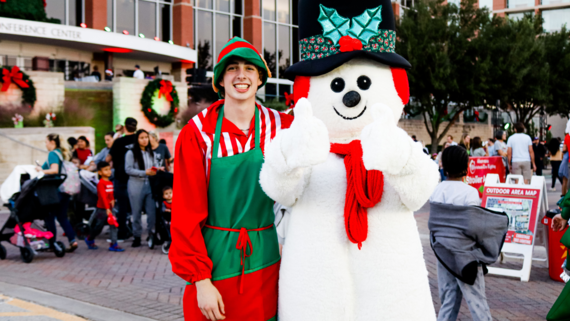 characters dressed up at the city's Christmas tree lighting event