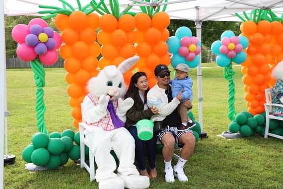 Family posing with the Easter bunny