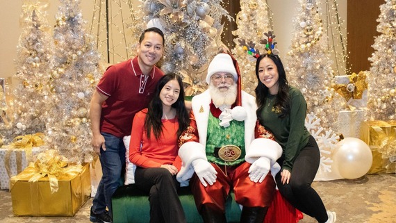 Photo of family with Santa at Hurst Christmas Tree Lighting