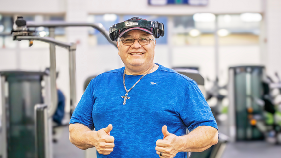 Photo of man at the Hurst Recreation Center gym smiling