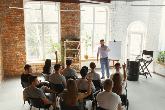 An instructor trains a group of employees