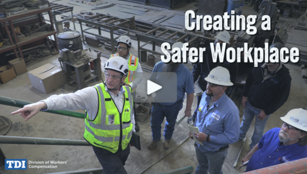A safety consultant advising employees at a job site.