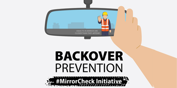 In a rearview mirror is a road work zone employee above the words, "Backover Prevention #MirrorCheckInitiative