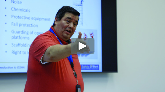 DWC Safety Training Manager lectures in front of an OSHA class.