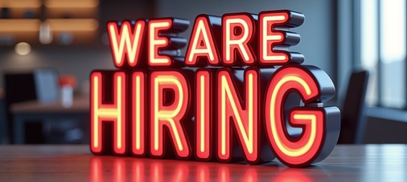 Neon lights, which read: "WE ARE HIRING"