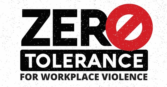 Black and read signage which reads, "Zero tolerance for workplace violence."