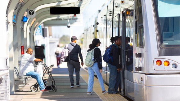 Passengers Board METRORail